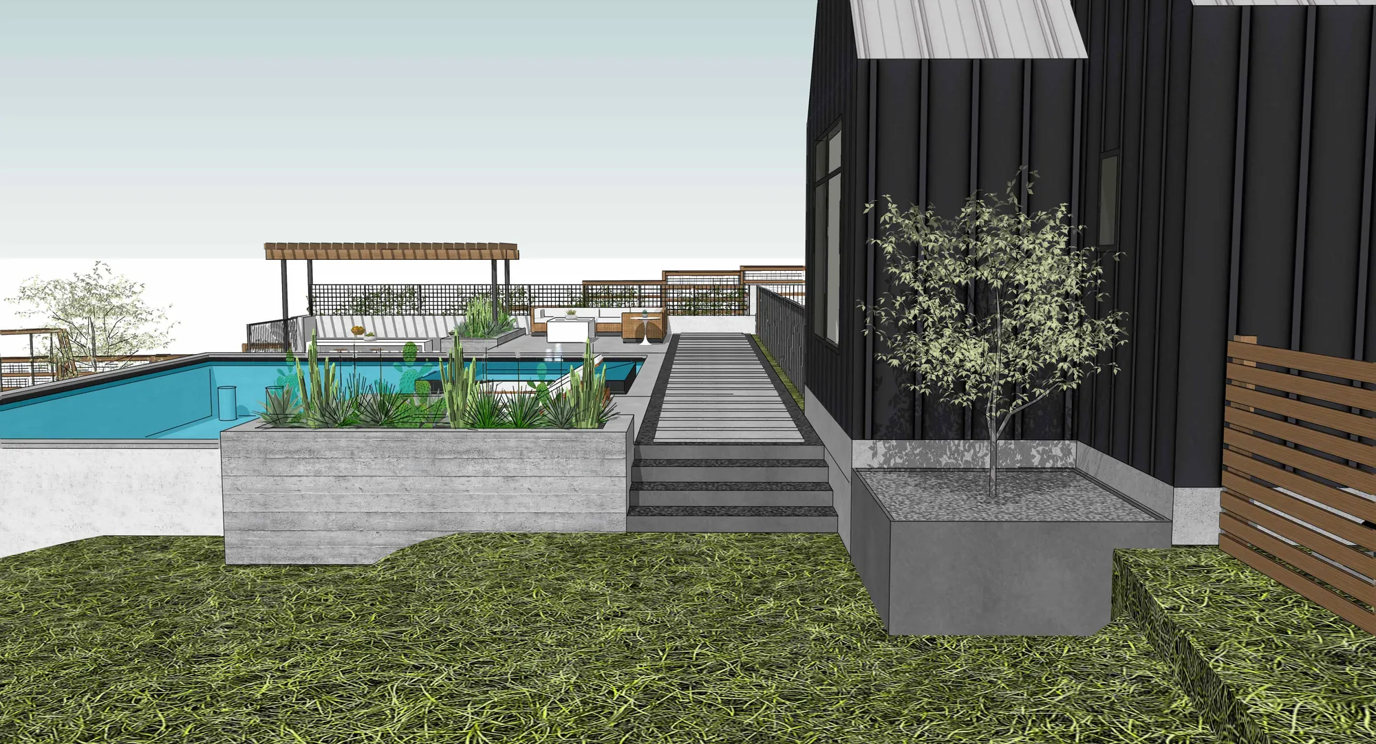 Ground-level view of the pool and deck laid out across the lot