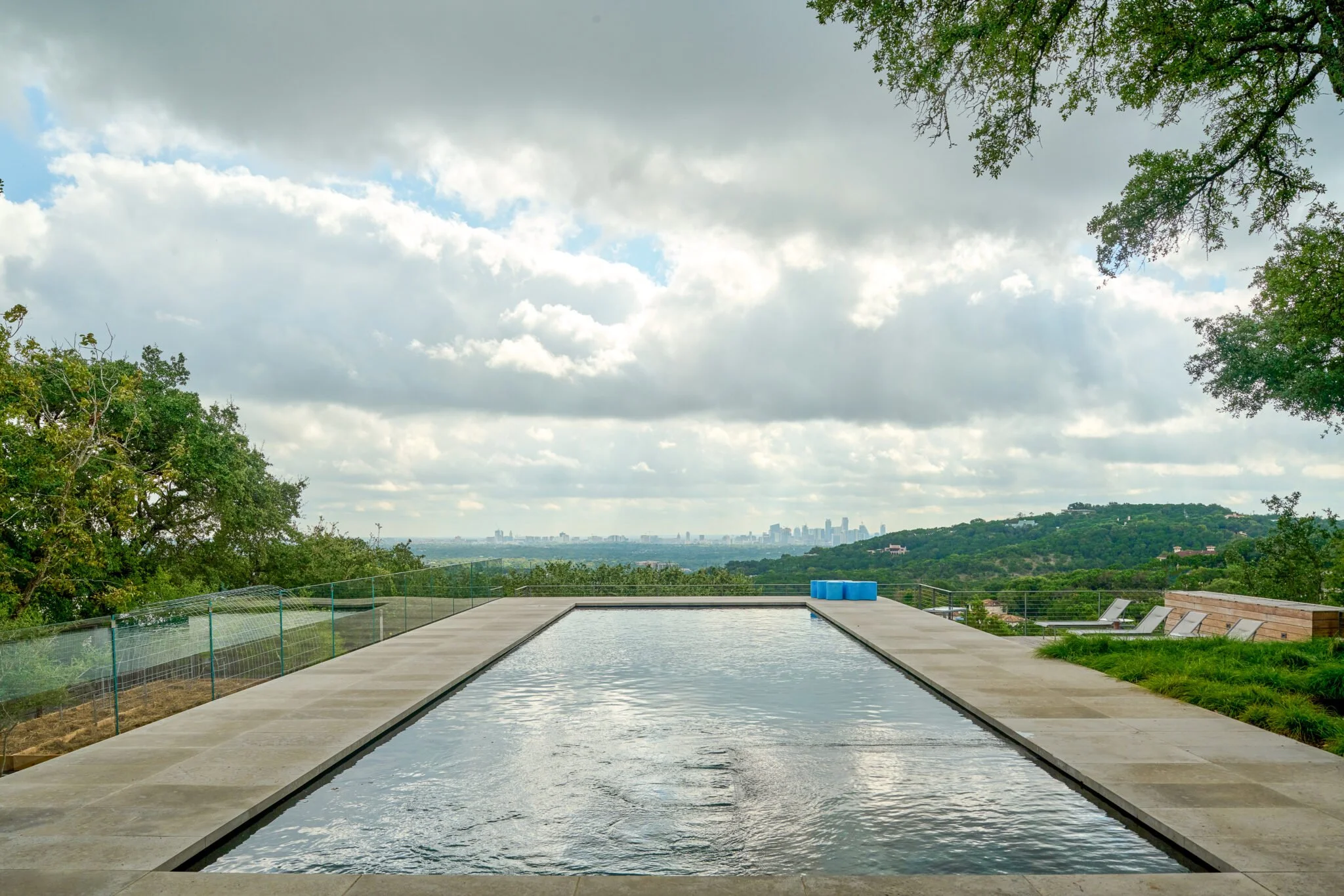 Custom gunite pool with a clean modern shape in an Austin backyard