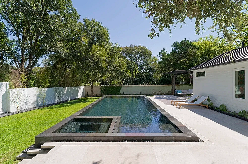 Compact custom pool in a contained Austin backyard